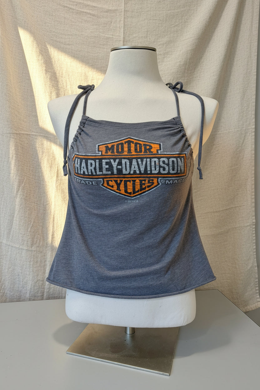 Gray tank top with Harley-Davidson logo on a mannequin against a beige curtain.