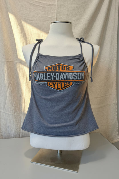 Gray tank top with Harley-Davidson logo on a mannequin against a beige curtain.