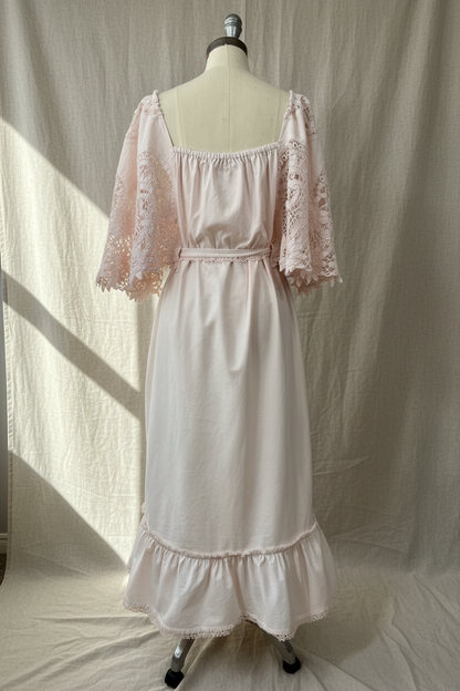 One-of-a-kind upcycled lace back view dress made from vintage Battenburg lace with inset pockets and adjustable tie waist, from the Quiet Heirlooms collection
