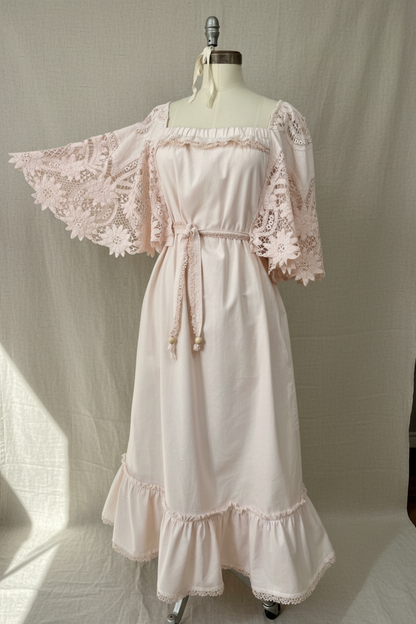 One-of-a-kind upcycled lace front view dress made from vintage Battenburg lace with inset pockets and adjustable tie waist, from the Quiet Heirlooms collection
